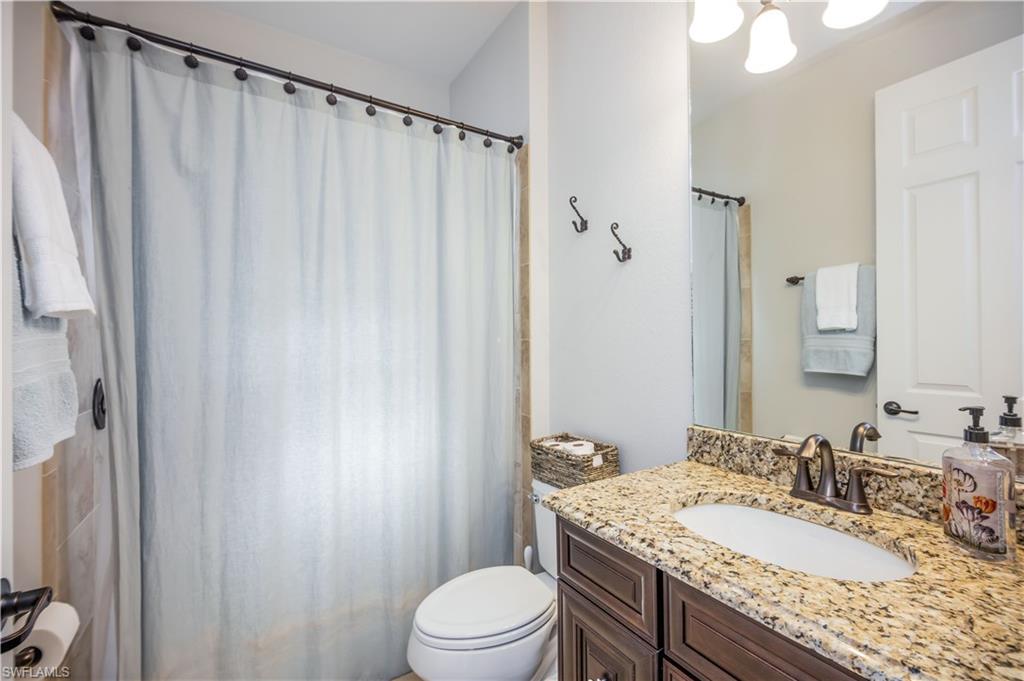 9422 Piacere Way Naples, FL 34113 - Photo 12 of 25 Guest Bathroom