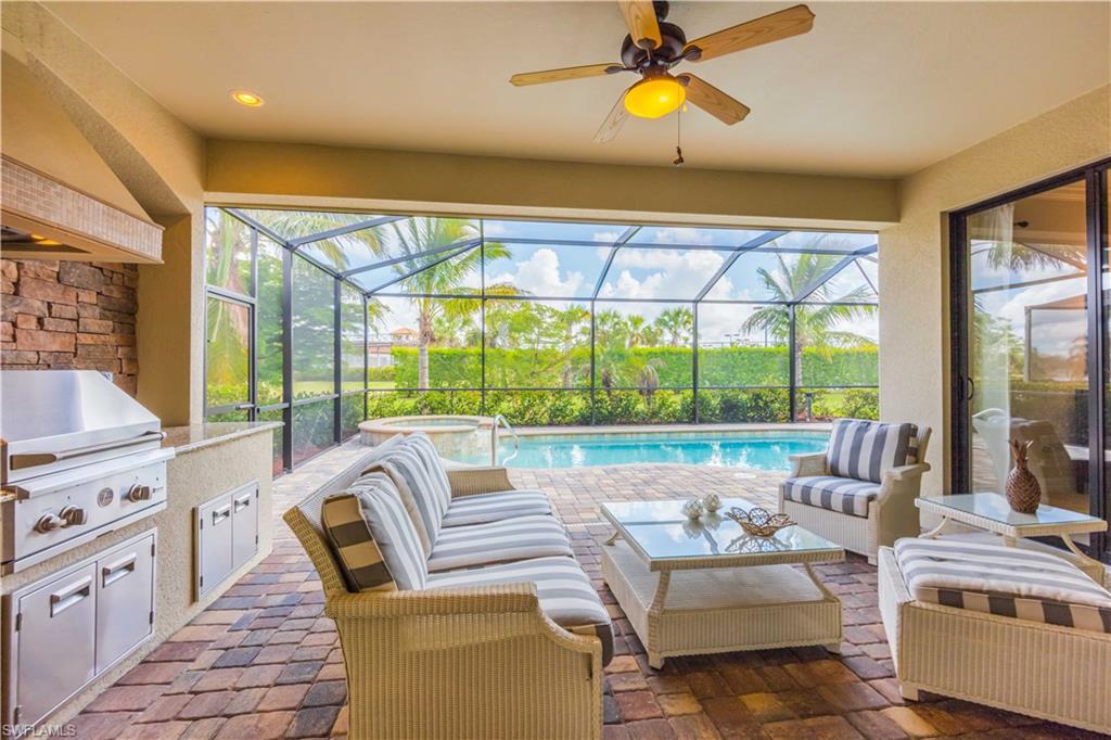 9422 Piacere Way Naples, FL 34113 - Photo 14 of 25 Large covered lanai with summer kitchen