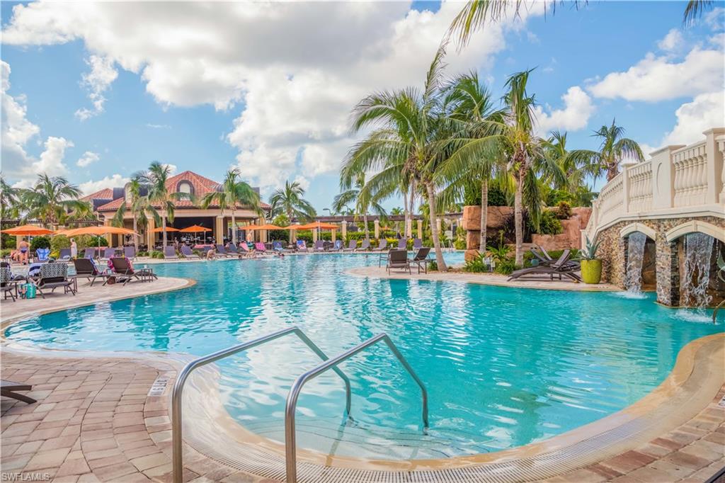 9422 Piacere Way Naples, FL 34113 - Photo 22 of 25 Resort-style pool with outside restaurant and bar