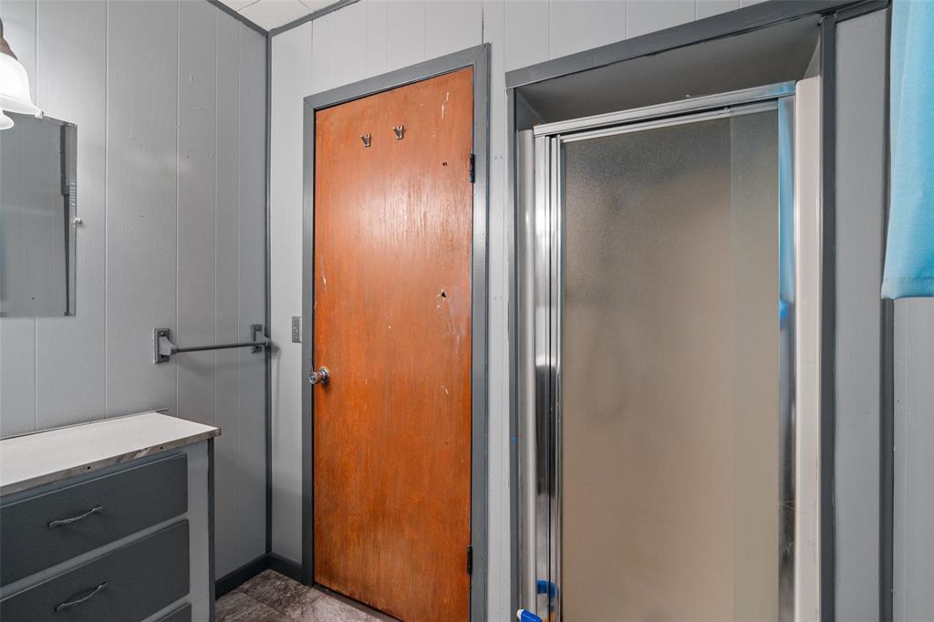302 West Grogan Street Hamilton, TX 76531 - Photo 24 of 33 Bathroom with a shower stall