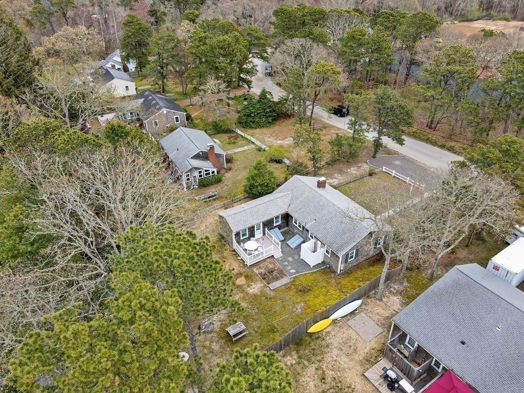 27 Naushon Road Dennis, MA 02639 - Photo 28 of 31 an aerial view of a house with a yard and lake view