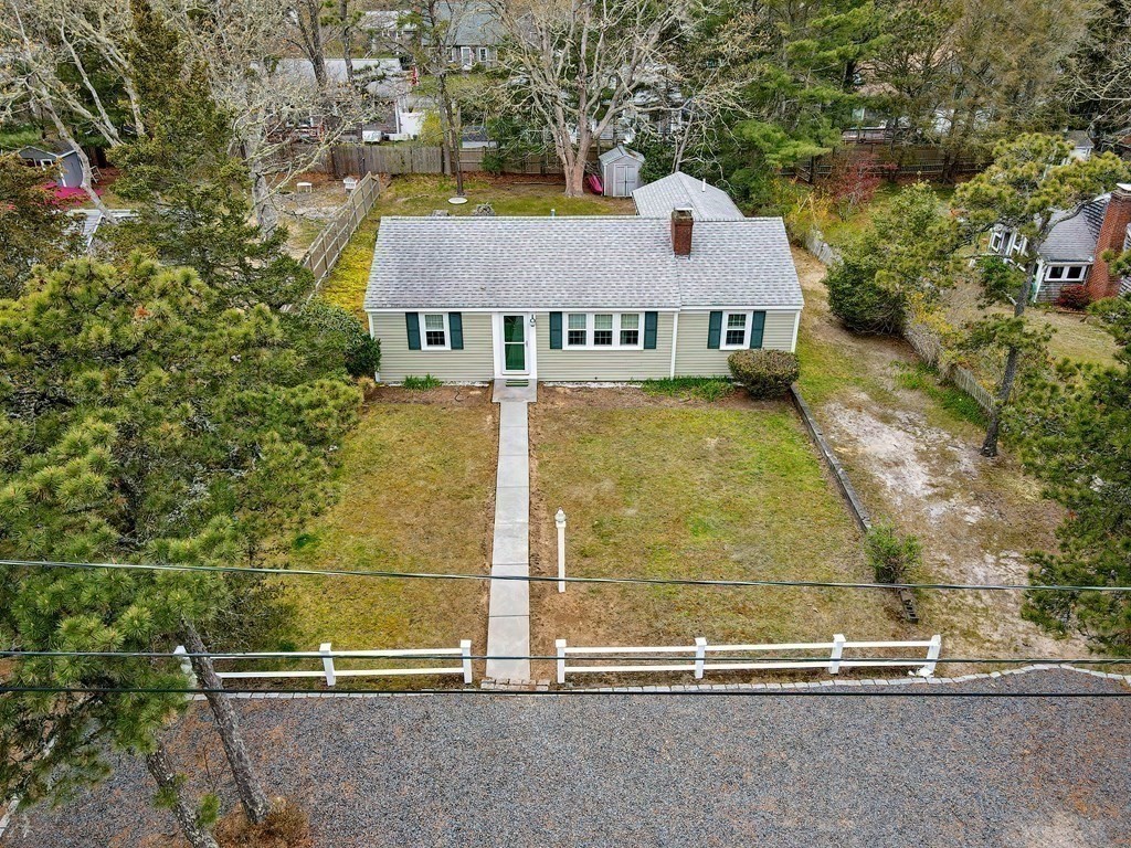 27 Naushon Road Dennis, MA 02639 - Photo 29 of 31 an aerial view of a house