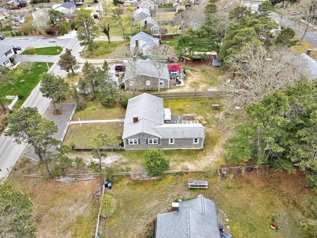27 Naushon Road Dennis, MA 02639 - Photo 30 of 31 a view of swimming pool with a yard and seating space