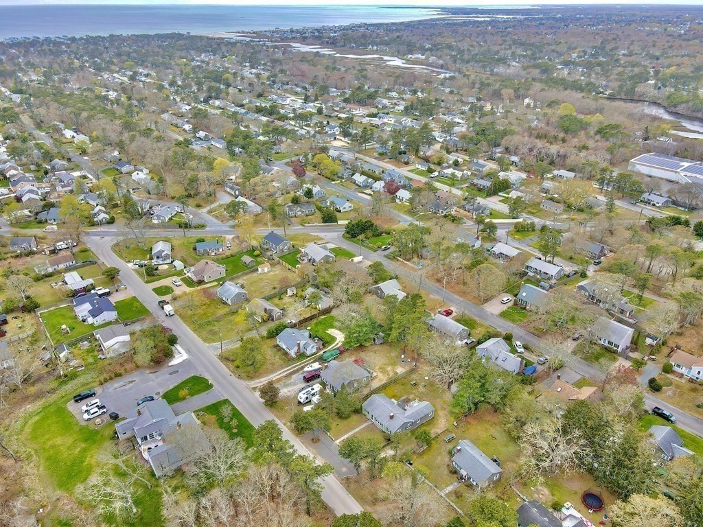 27 Naushon Road Dennis, MA 02639 - Photo 31 of 31 an aerial view of residential houses with outdoor space