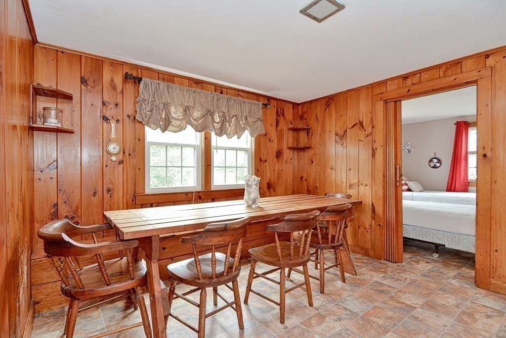 27 Naushon Road Dennis, MA 02639 - Photo 7 of 31 a dining room with furniture and window