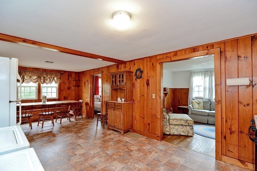 27 Naushon Road Dennis, MA 02639 - Photo 10 of 31 a view of a livingroom with furniture and a livingroom