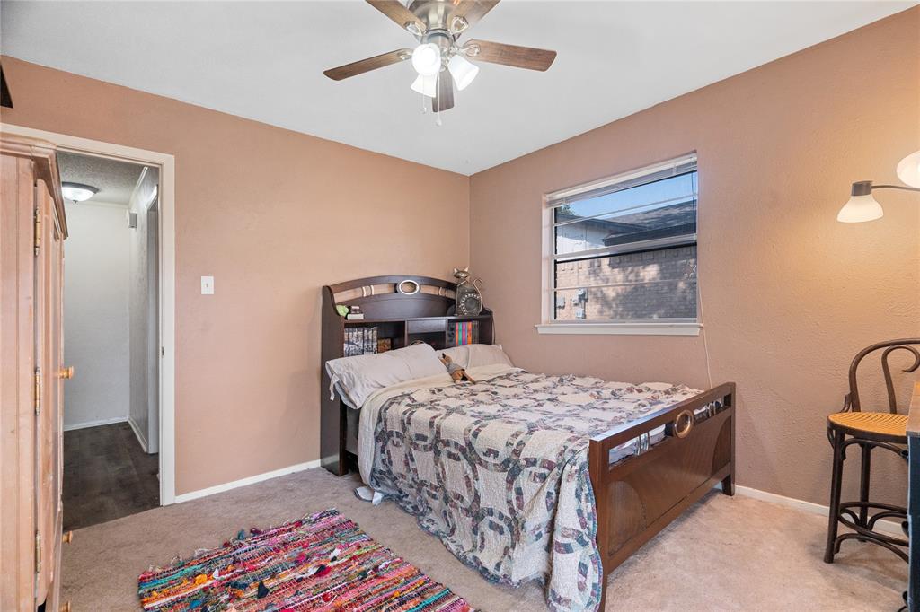2001 Chalice Road Arlington, TX 76014 - Photo 17 of 38 Bedroom #2 pops with contrasting paint and natural light.