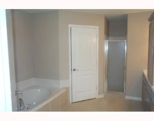 a bathroom with a bathtub and a sink