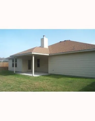 a black and white photo of a house