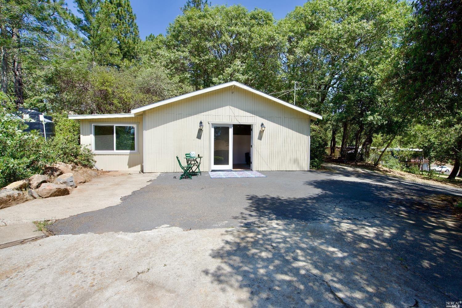 521 Viewridge Drive Angwin, CA 94508 - Photo 1 of 1 a view of a house with a yard and large trees