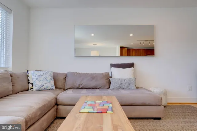 a living room with furniture and a couch