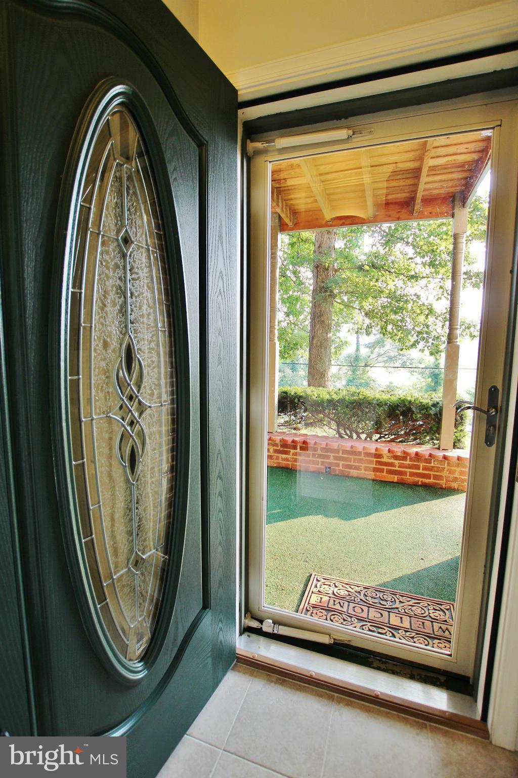 18049 Possum Point Road Dumfries, VA 22026 - Photo 23 of 30 a view of a door view with a garden