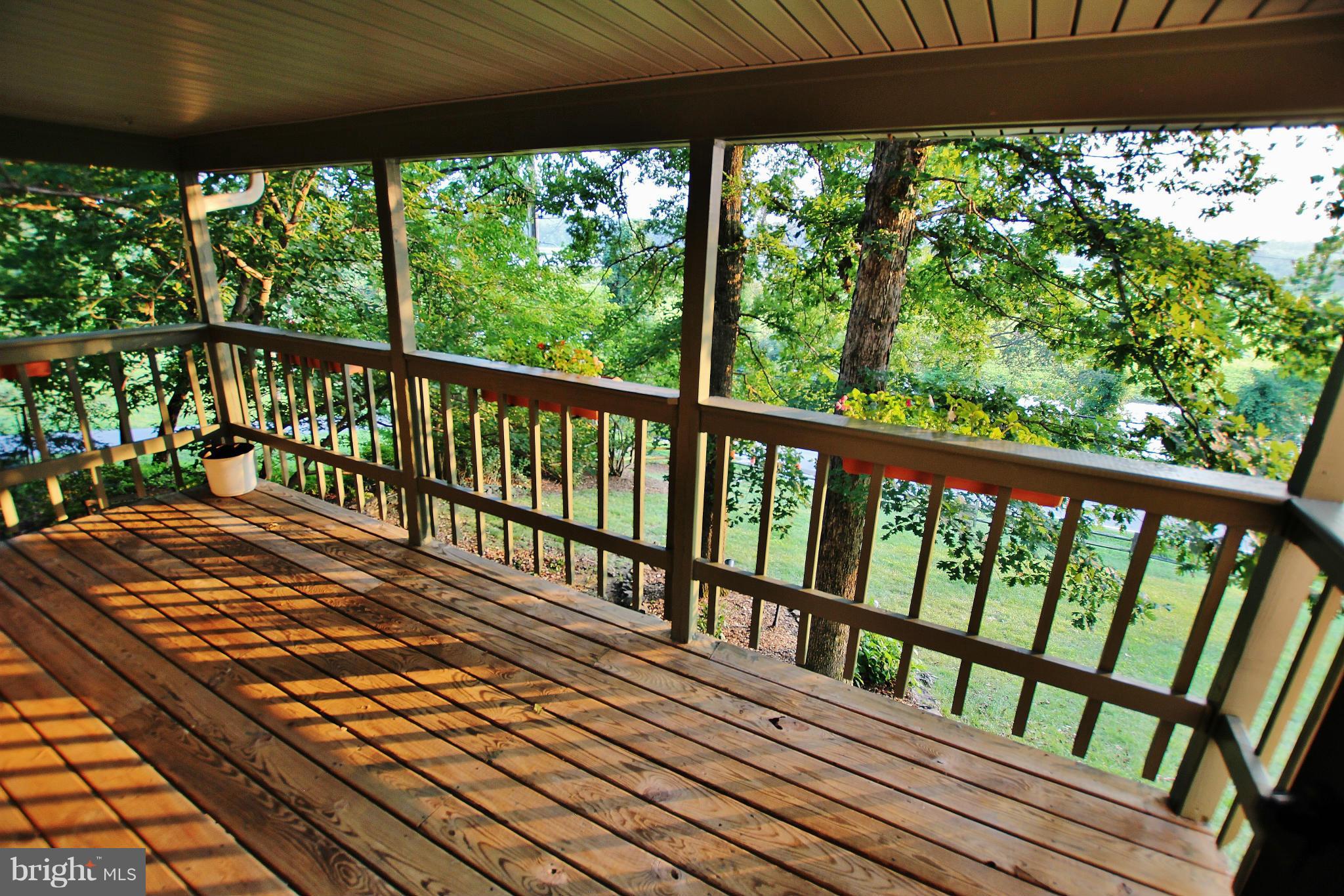 18049 Possum Point Road Dumfries, VA 22026 - Photo 6 of 30 a view of a balcony with wooden floor
