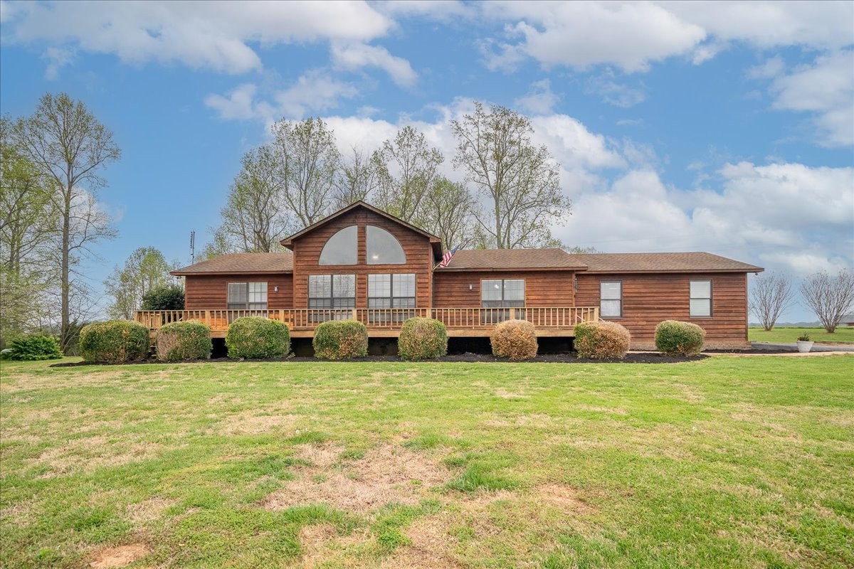 79 French Road Loretto, TN 38469 - Photo 4 of 52 a view of a house with a big yard and large trees