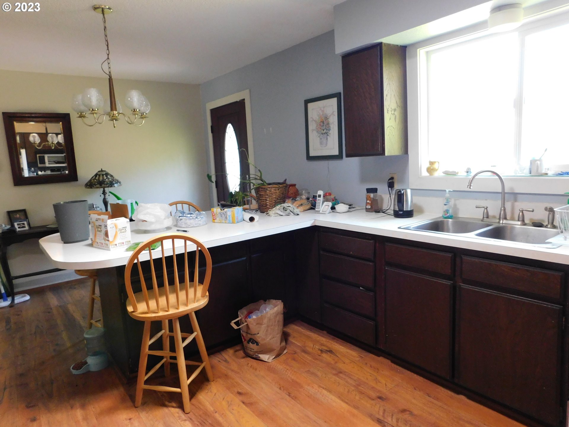 1968 View Street Myrtle Point, OR 97458 - Photo 13 of 27 a bathroom with a sink a mirror and a lamp