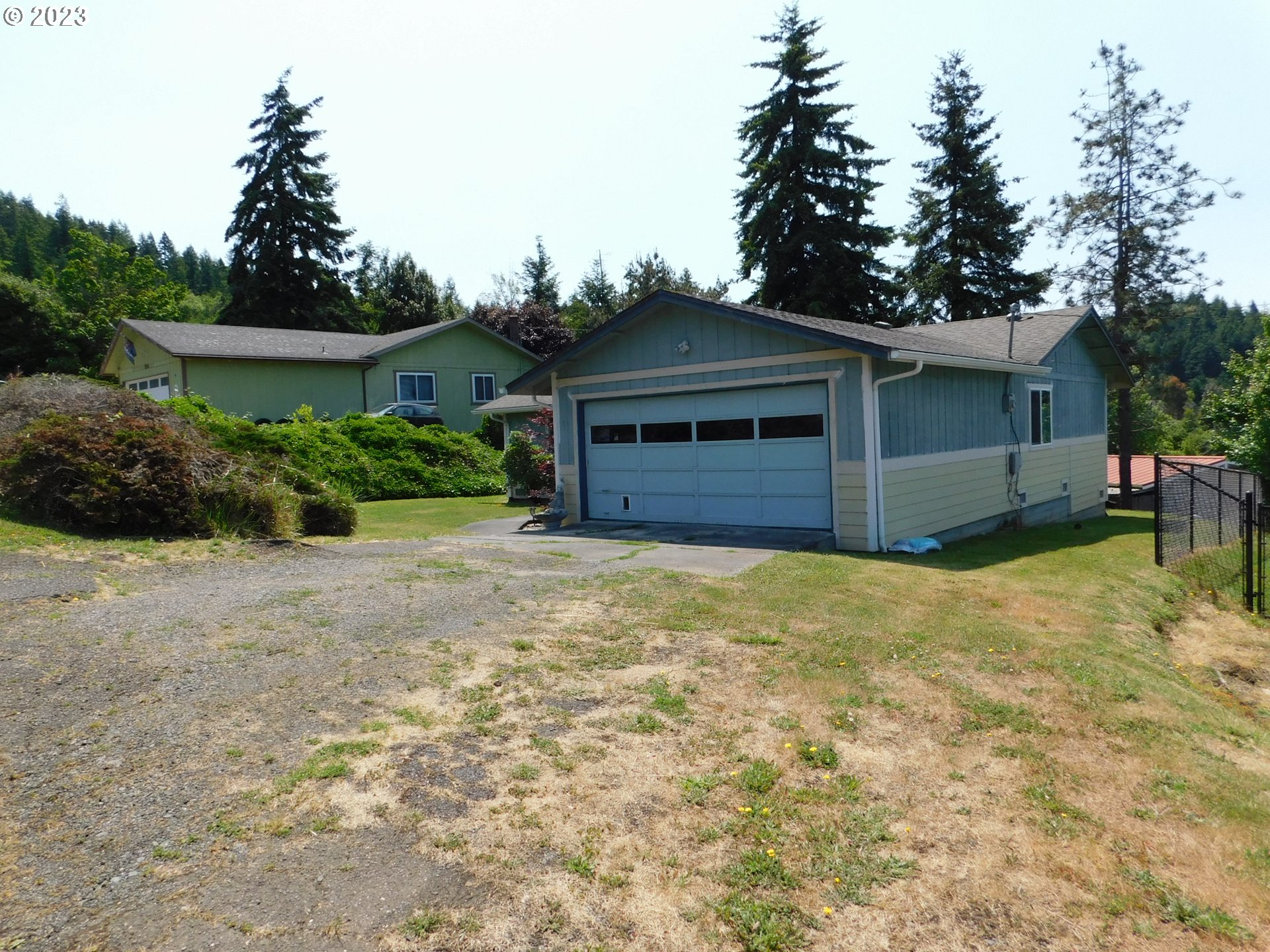 1968 View Street Myrtle Point, OR 97458 - Photo 2 of 27 front view of a house with a yard
