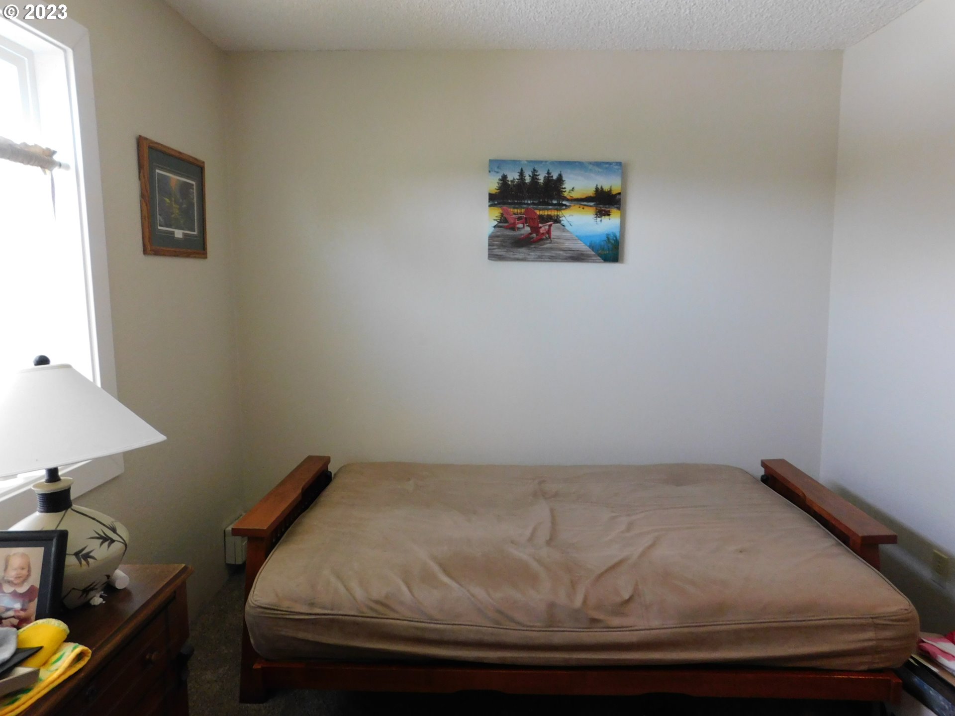 1968 View Street Myrtle Point, OR 97458 - Photo 22 of 27 a room with a bed