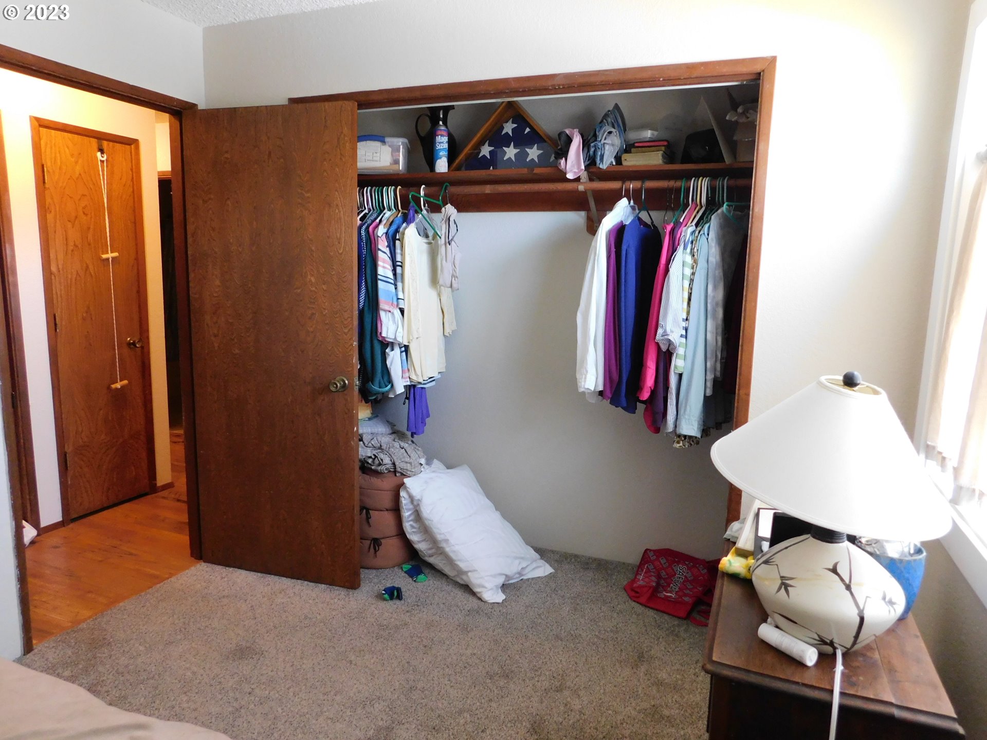 1968 View Street Myrtle Point, OR 97458 - Photo 23 of 27 a view of walk in closet with clothes and shoes