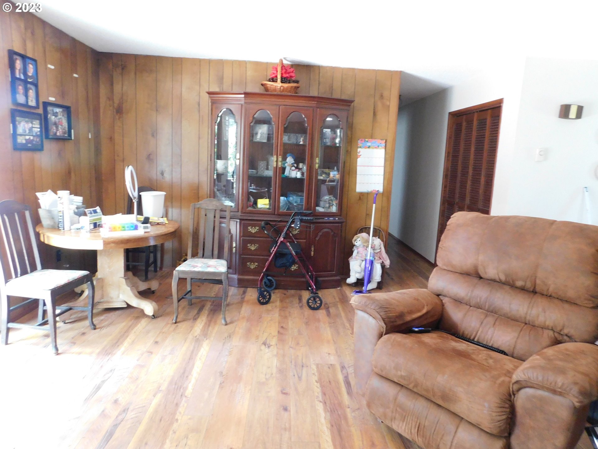 1968 View Street Myrtle Point, OR 97458 - Photo 9 of 27 a living room with furniture and wooden floor