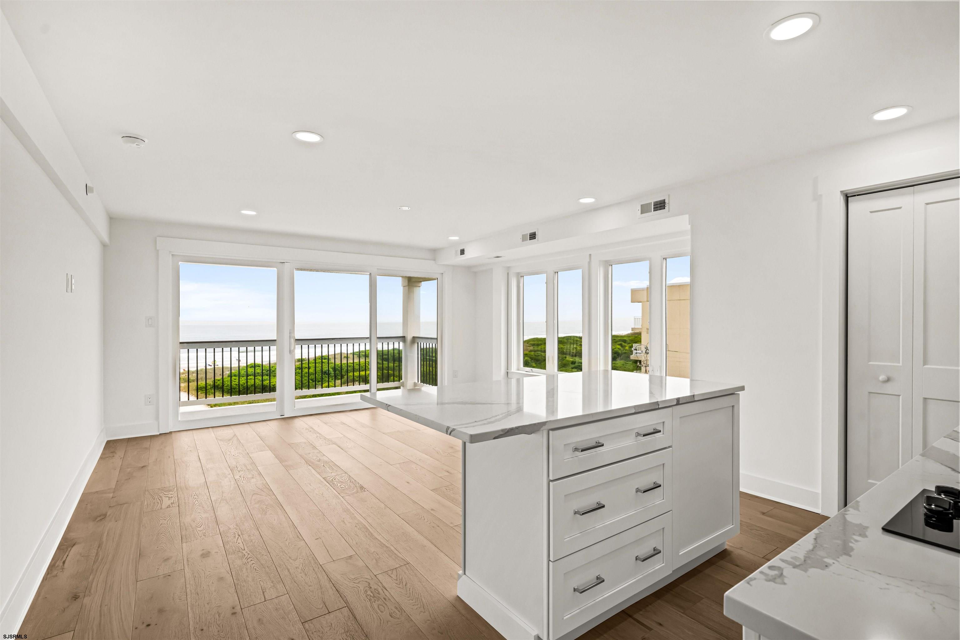 321 South 6th Street, Unit 4 Brigantine, NJ 08203 - Photo 21 of 26 a room with window and bed