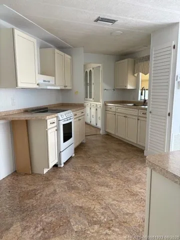 $44,900 | 443 Northeast Pinelake Village Boulevard, Jensen Beach, FL 34957