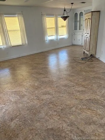 $44,900 | 443 Northeast Pinelake Village Boulevard, Jensen Beach, FL 34957