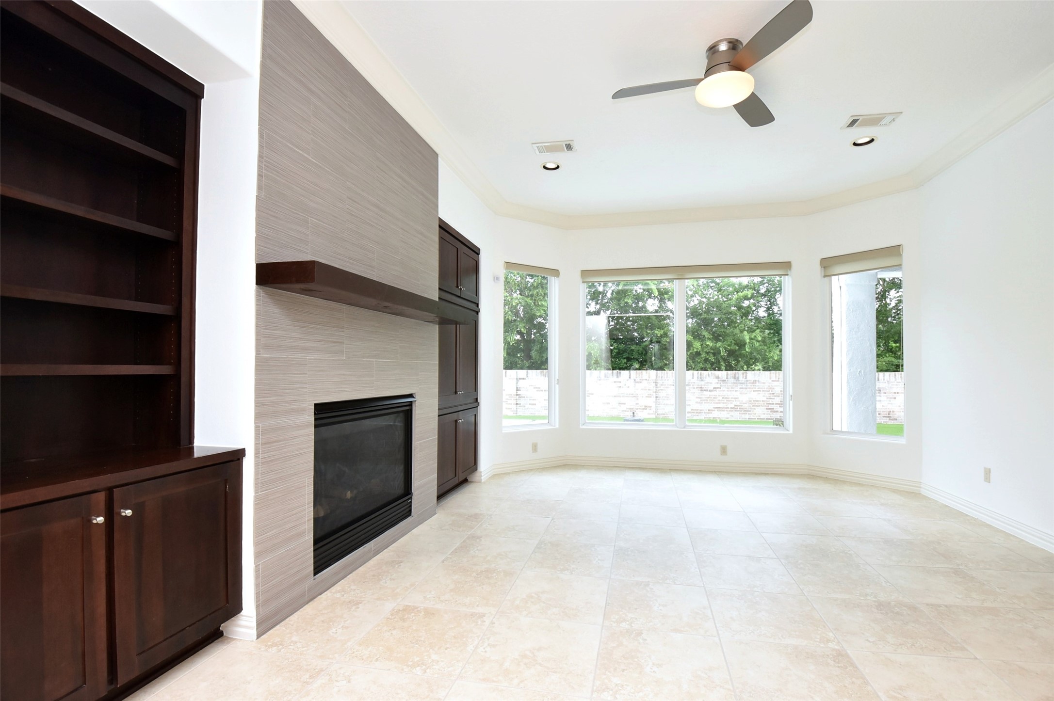 2014 Split Branch Court Houston, TX 77077 - Photo 7 of 47 a view of empty room with a fireplace and a window