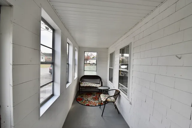 a room with furniture and a window