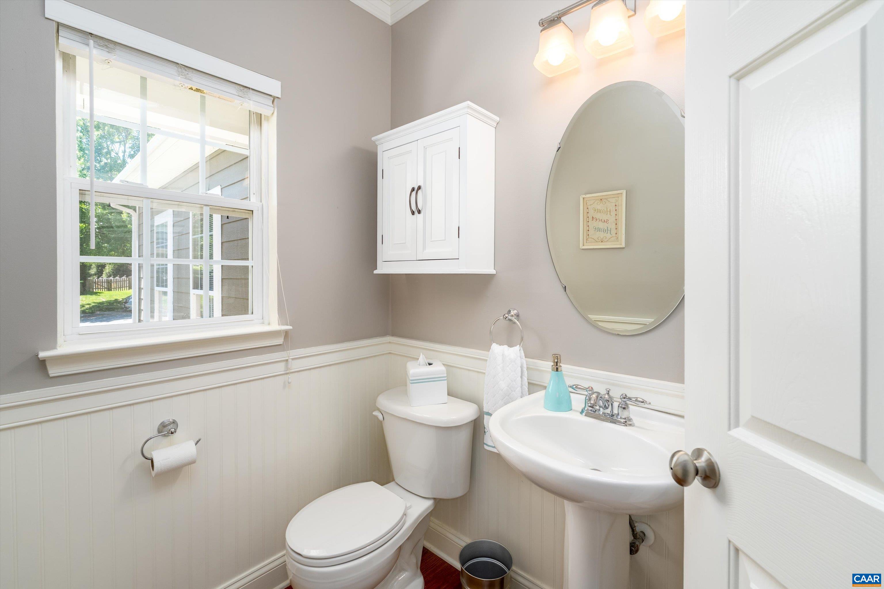 5366 Park Road Crozet, VA 22932 - Photo 36 of 61 a bathroom with a toilet a sink and a mirror
