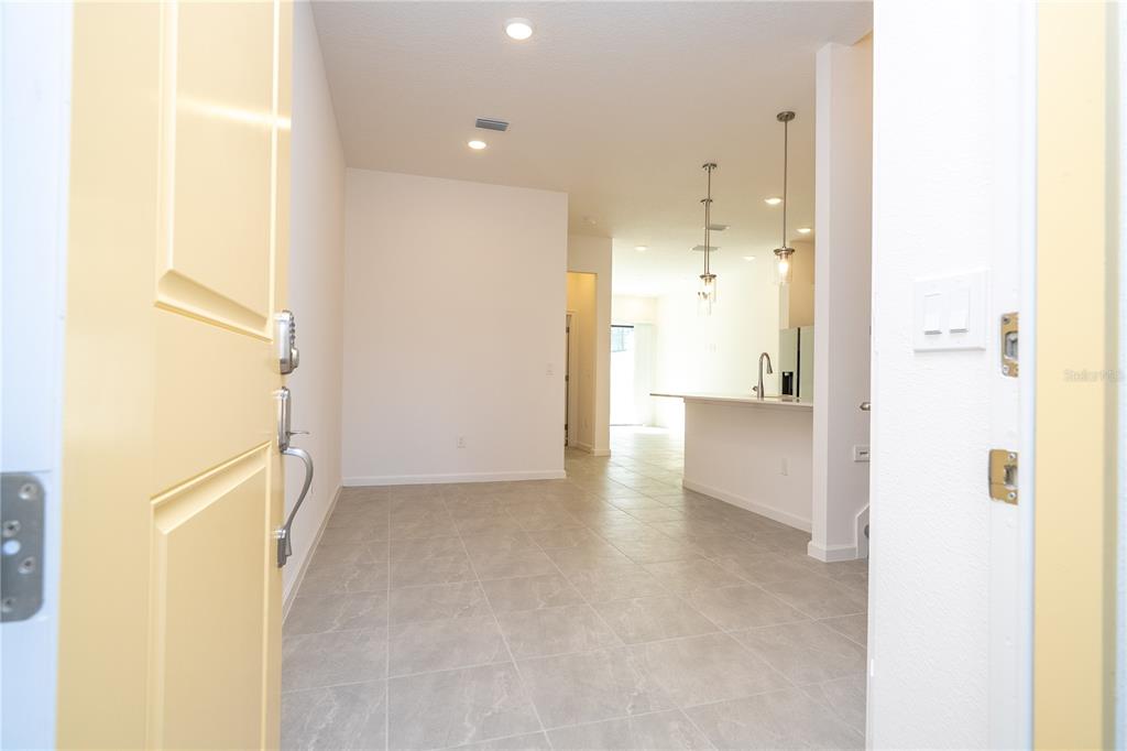 10580 Ebb Tide Lane Orlando, FL 32821 - Photo 8 of 58 a view of a bathroom with a hallway