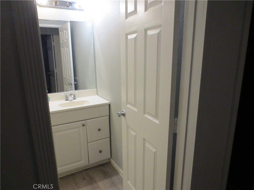 5855 Challen Avenue Riverside, CA 92503 - Photo 11 of 19 a bathroom with a sink and mirror