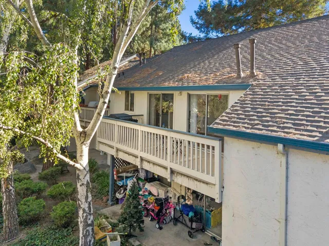 an outdoor view of a house with balcony
