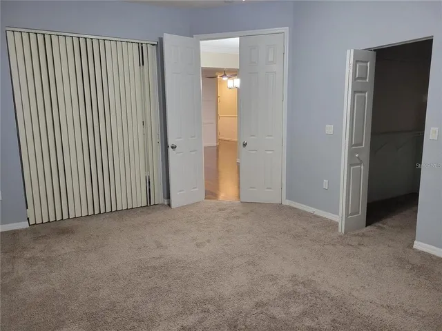 a view of a livingroom with a hallway