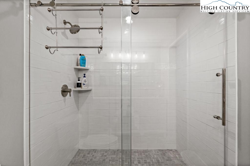 1157 Pine Ridge Road Beech Mountain, NC 28604 - Photo 20 of 41 a bathroom with a shower