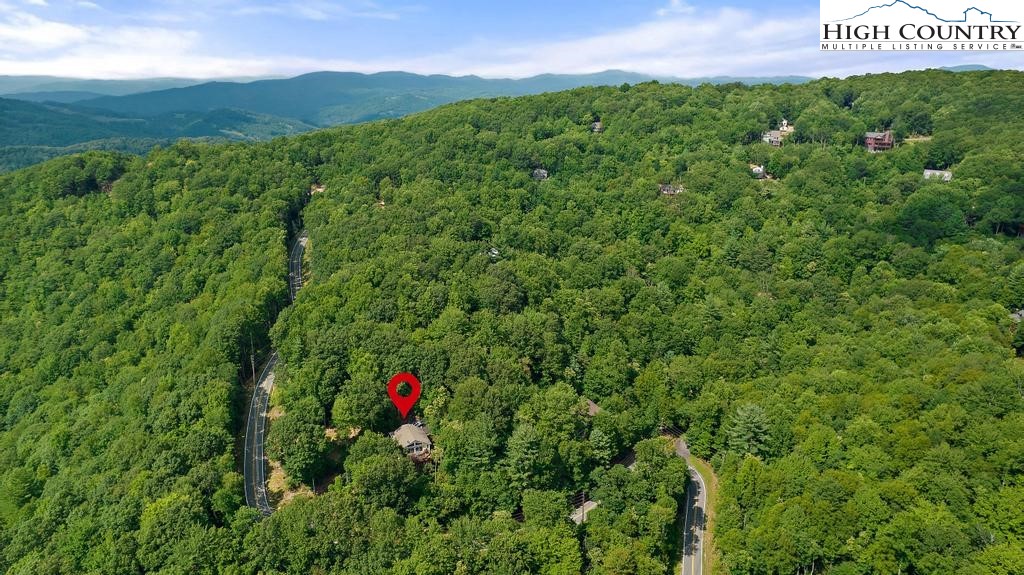 1157 Pine Ridge Road Beech Mountain, NC 28604 - Photo 30 of 41 a view of a lush green field