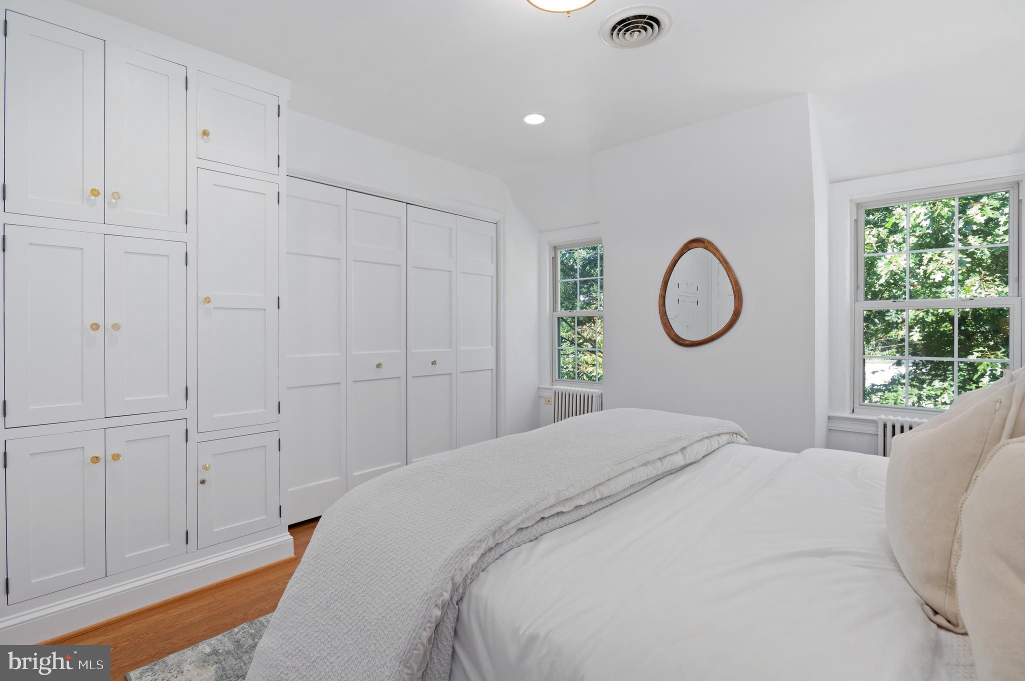 1955 39th Street Northwest Washington, DC 20007 - Photo 16 of 25 Bedroom 2 w/ ample closet space and custom cabinet