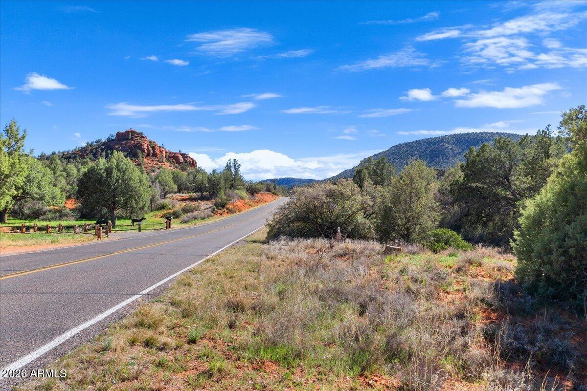 2727 Verde Valley School Road Sedona, AZ 86336 - Photo 15 of 22 a view of a road with a yard