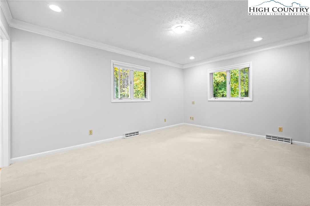 164 Appalachian Drive Boone, NC 28607 - Photo 16 of 43 an empty room with windows