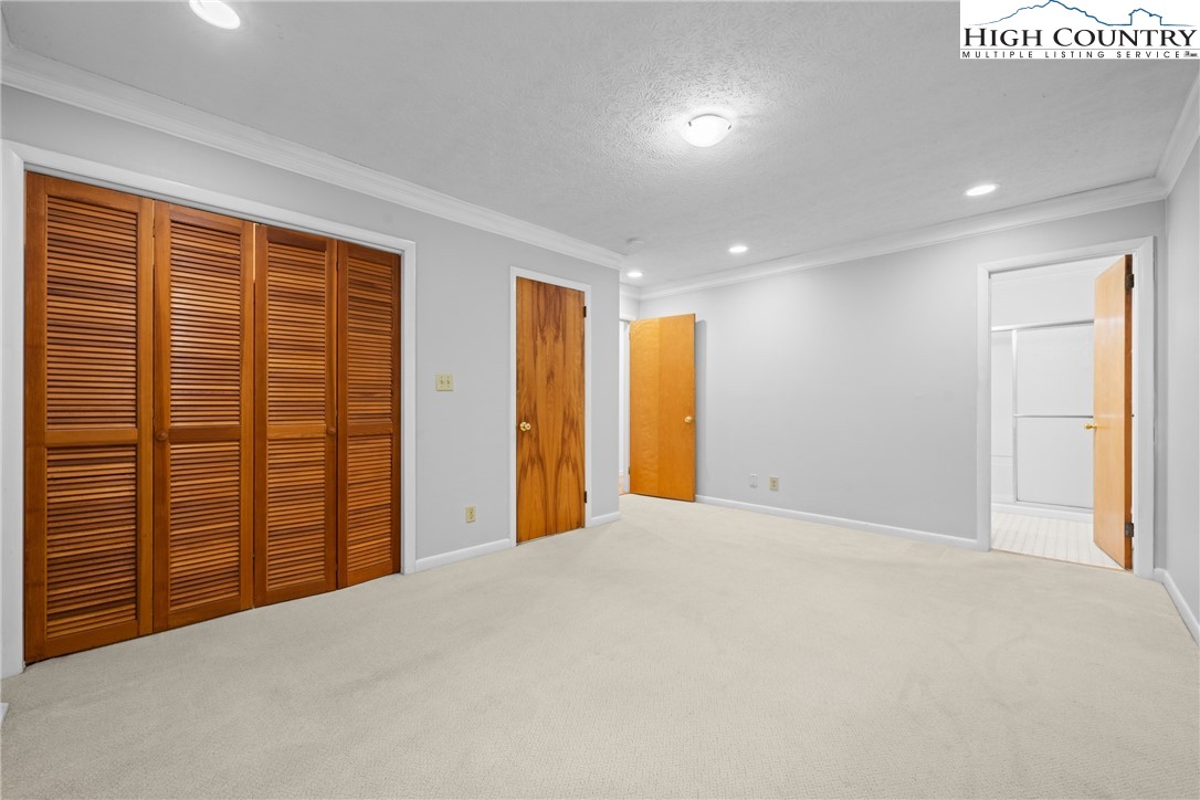 164 Appalachian Drive Boone, NC 28607 - Photo 17 of 43 a view of an empty room with a window