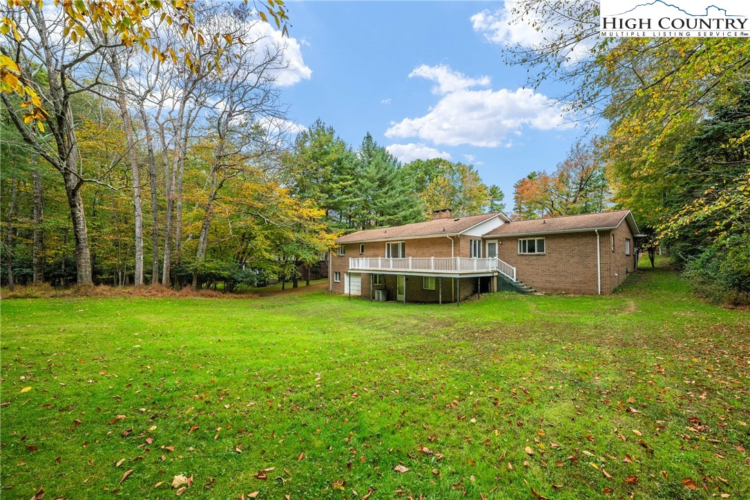 164 Appalachian Drive Boone, NC 28607 - Photo 42 of 43 a view of a house with a backyard