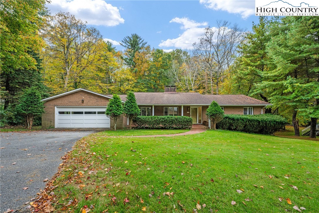 164 Appalachian Drive Boone, NC 28607 - Photo 43 of 43 a house view with a garden space
