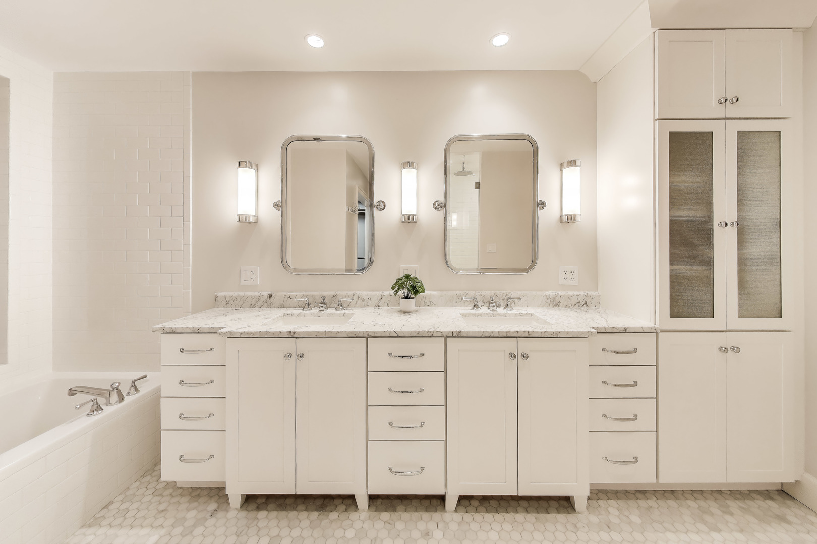 628 West Grace Street, Unit 2W Chicago, IL 60613 - Photo 24 of 32 a bathroom with a granite countertop sink double vanity and a mirror