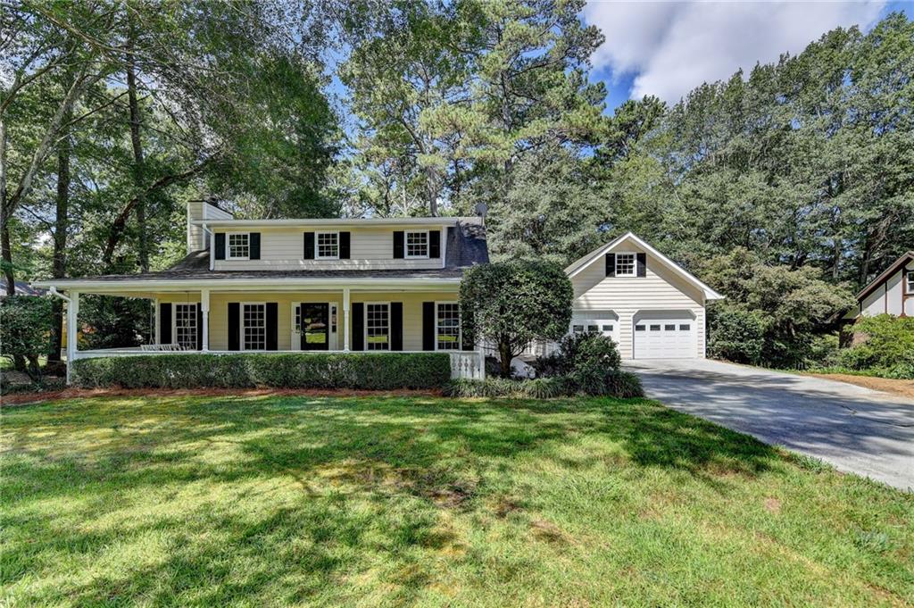 1981 Shoreline Trace Southwest Grayson, GA 30017 - Photo 1 of 1 a front view of a house with a yard
