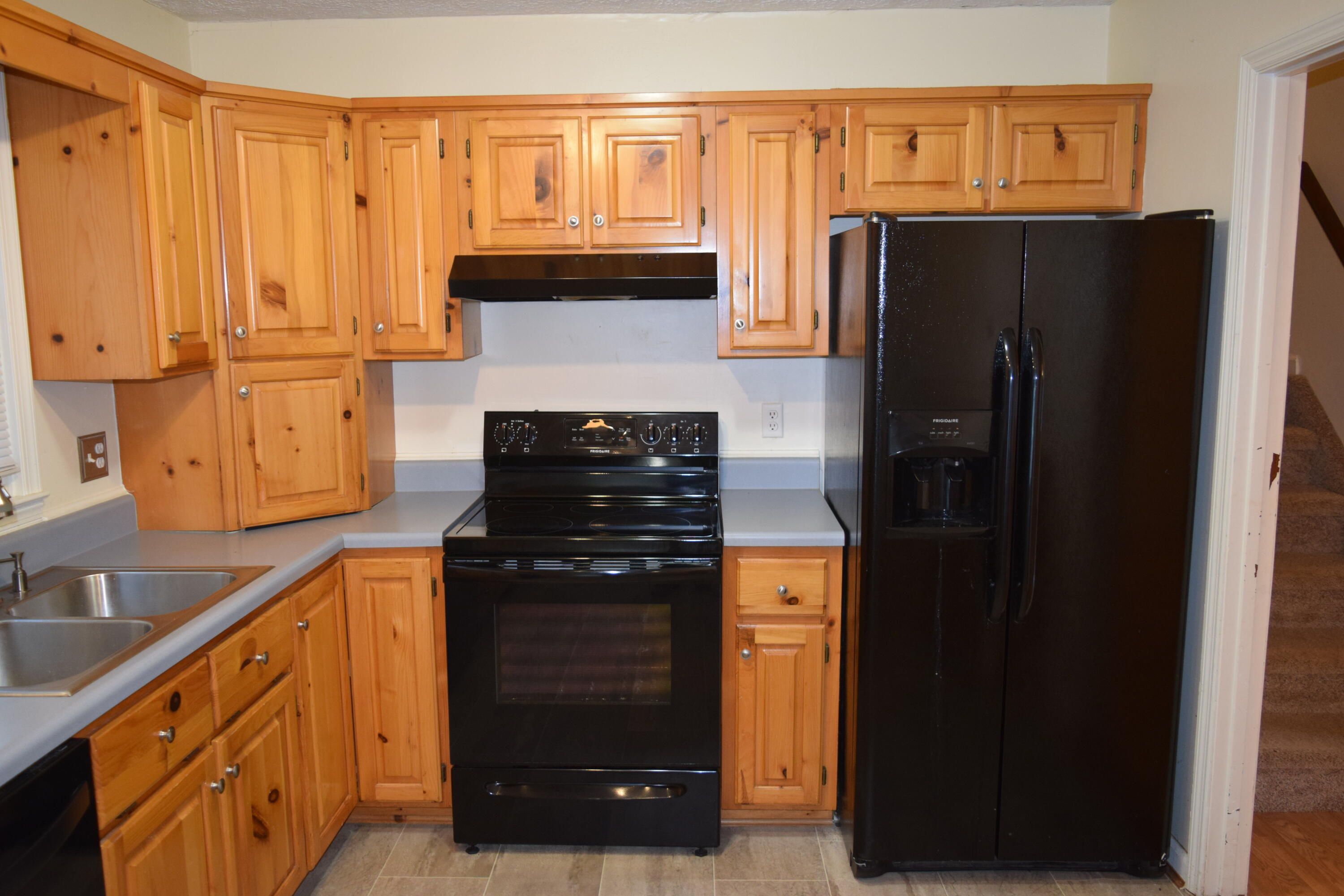 162 Ridgeview Road Northwest Floyd, VA 24091 - Photo 12 of 47 a kitchen with a refrigerator and a sink