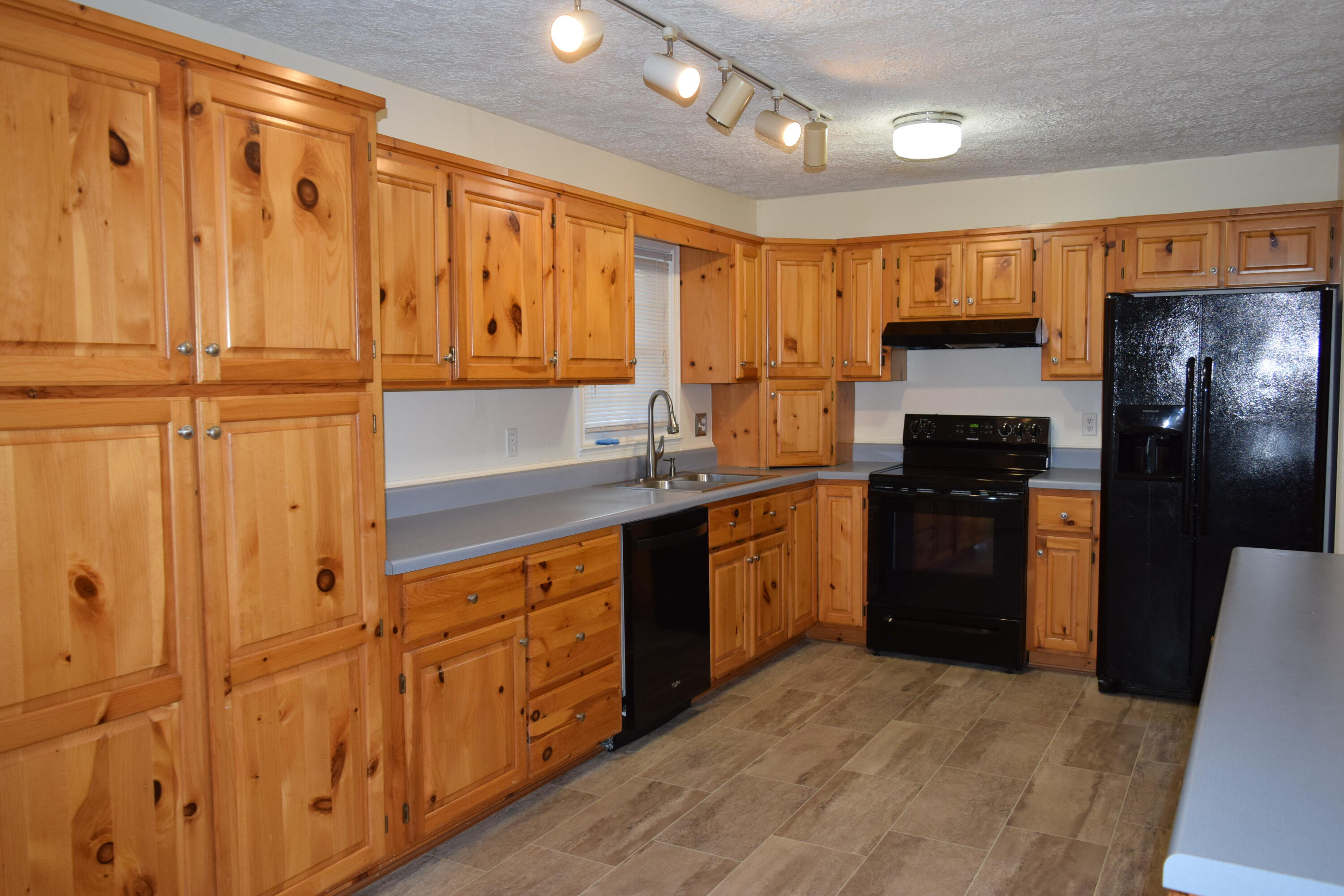 162 Ridgeview Road Northwest Floyd, VA 24091 - Photo 13 of 47 a kitchen with stainless steel appliances granite countertop a refrigerator a sink and dishwasher