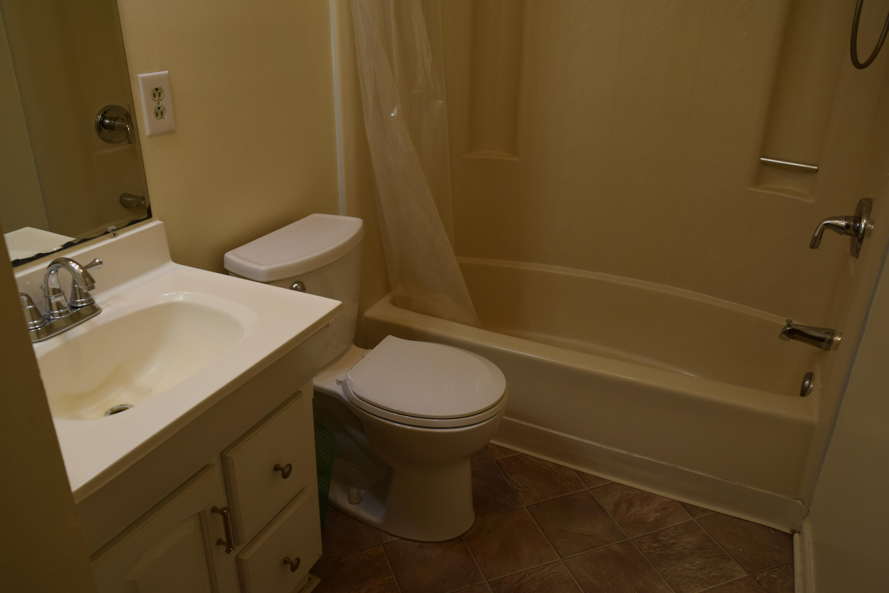 162 Ridgeview Road Northwest Floyd, VA 24091 - Photo 20 of 47 a toilet sitting next to a white sink and vanity