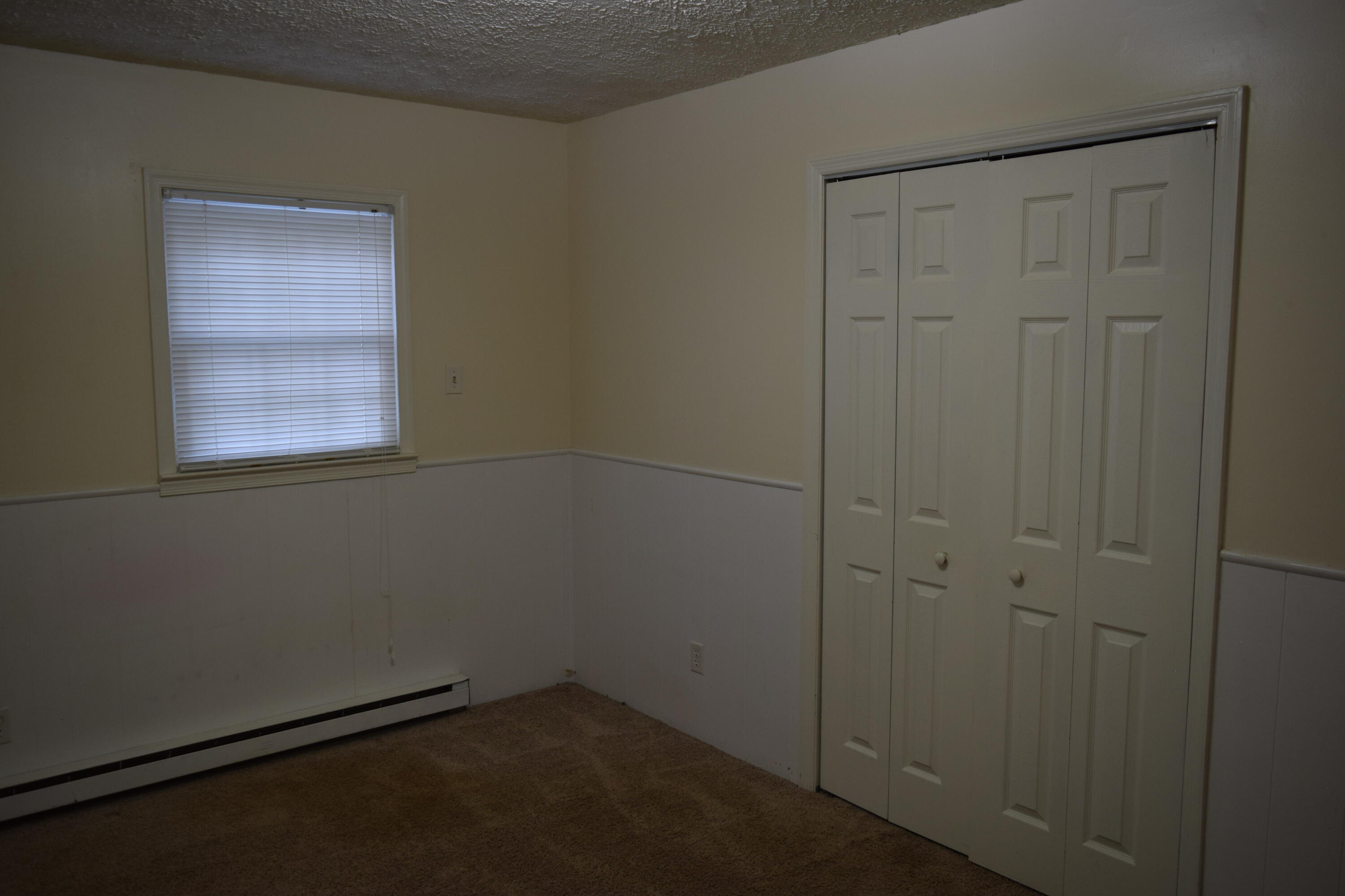 162 Ridgeview Road Northwest Floyd, VA 24091 - Photo 22 of 47 an empty room with a window