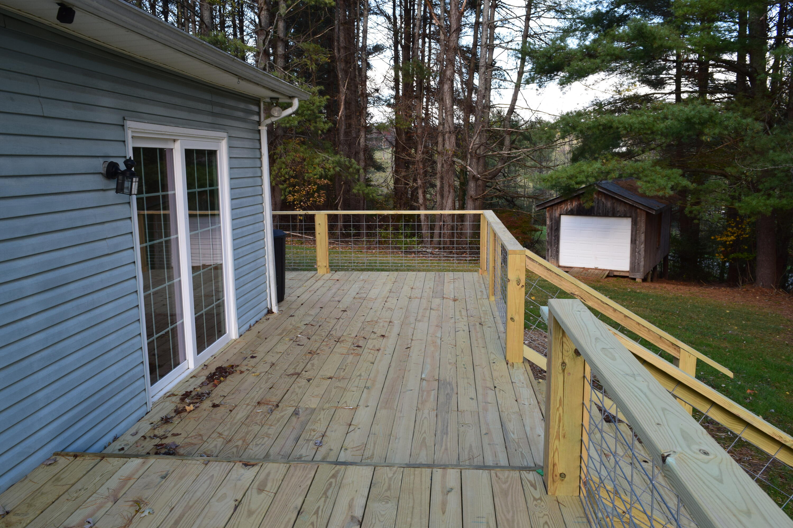 162 Ridgeview Road Northwest Floyd, VA 24091 - Photo 41 of 47 a view of a balcony with wooden floor and fence