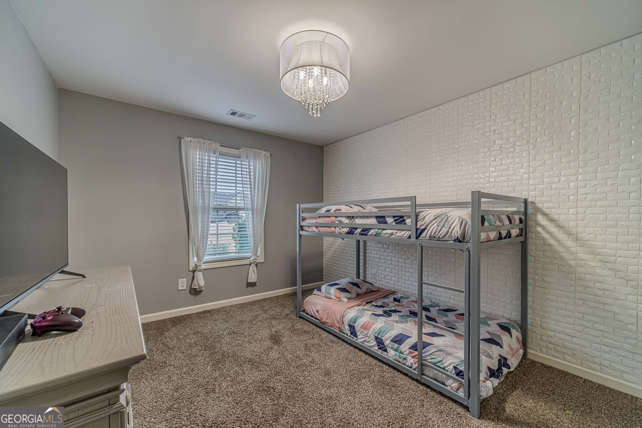 149 Peak Court Winder, GA 30680 - Photo 18 of 27 a bedroom with bed and a window