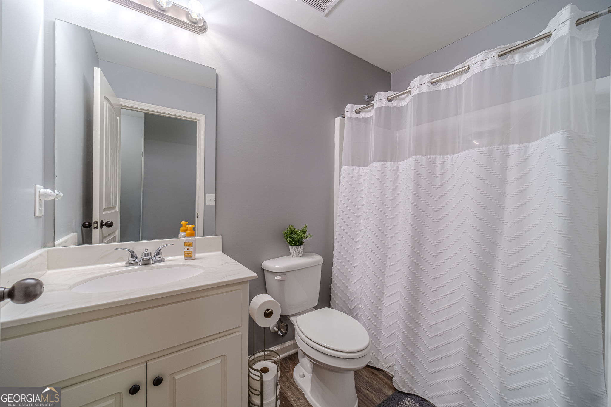 149 Peak Court Winder, GA 30680 - Photo 19 of 27 a bathroom with a sink toilet and shower